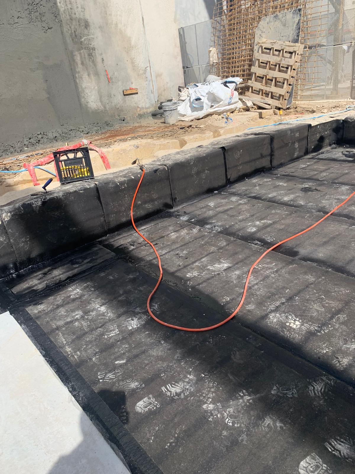 Below grade deck sheet membrane torched down with sealed upstands