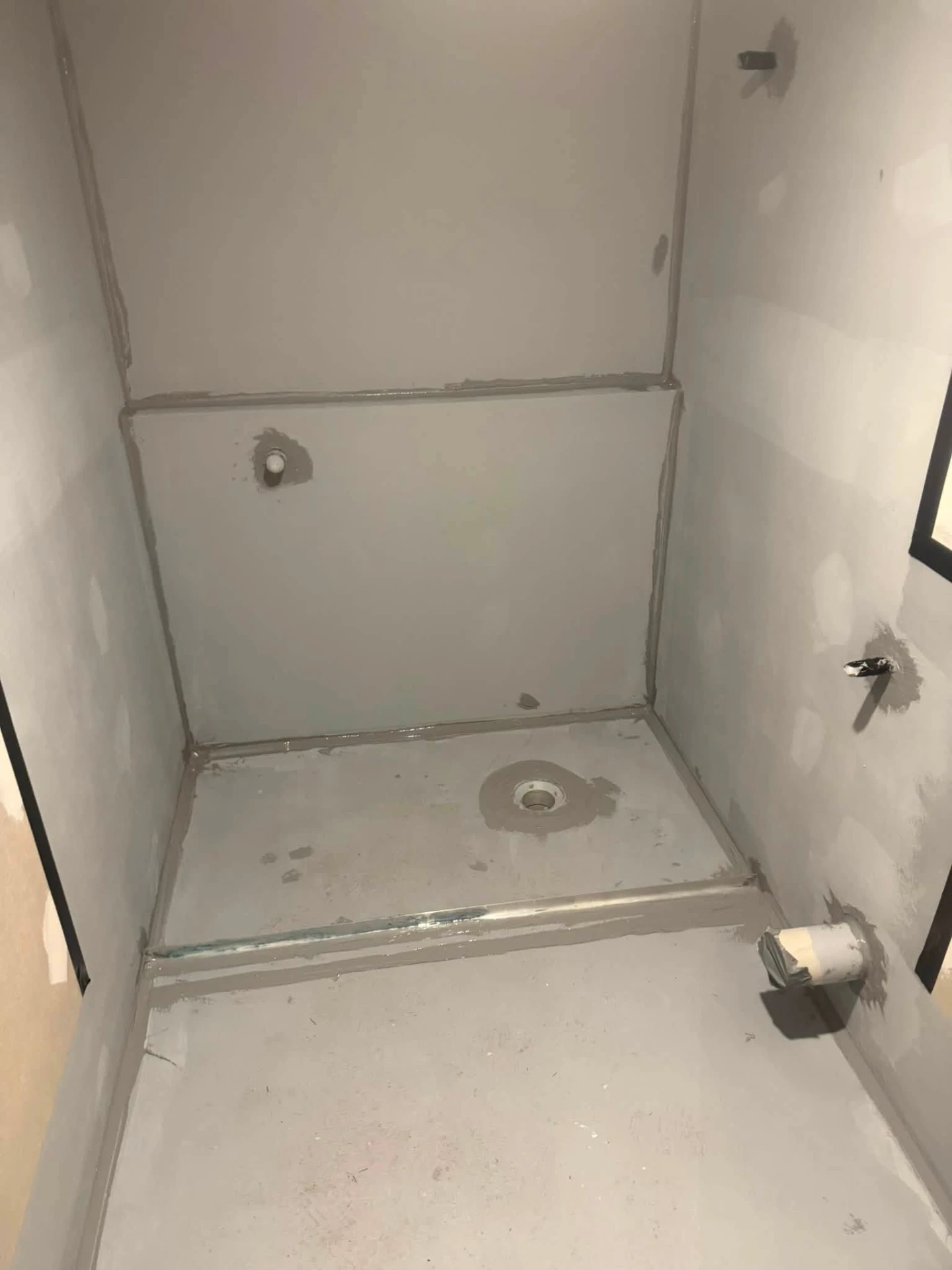 Shower recess prepared and bond-breaker sealed before membrane application